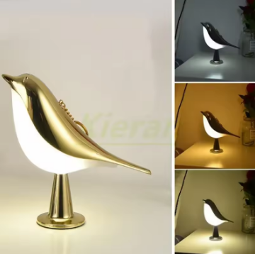 Bird-shaped lamp with gold finish on a white background, shown in various settings.
