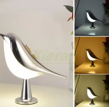 Bird-shaped lamp with multiple light settings on a white background