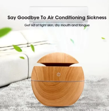 Wooden humidifier on a light background with text about air conditioning sickness.